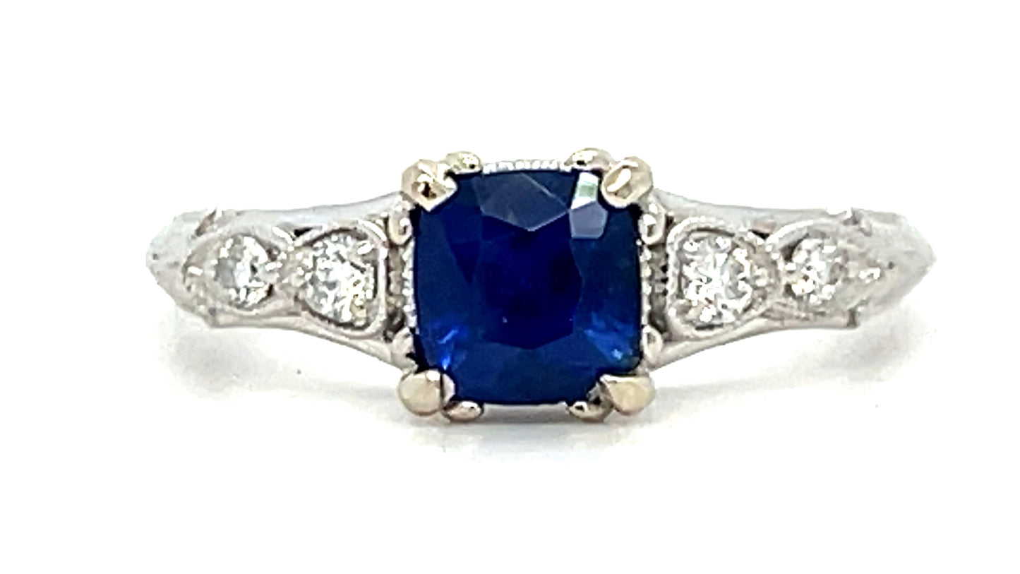 1.03ct Sapphire & 0.14ctw Diamond 18KW 2.64gr Ring Size 6.50