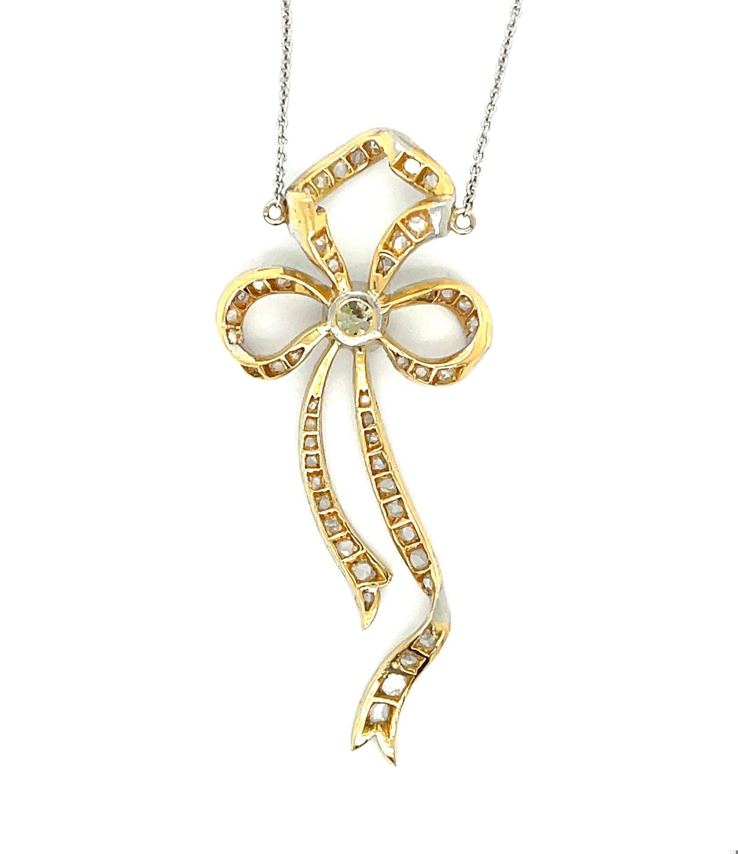 Edwardian (1900s) .30ct Old Euro Dia 1.50ct SD PT over 18KY Antique Bow Pendant