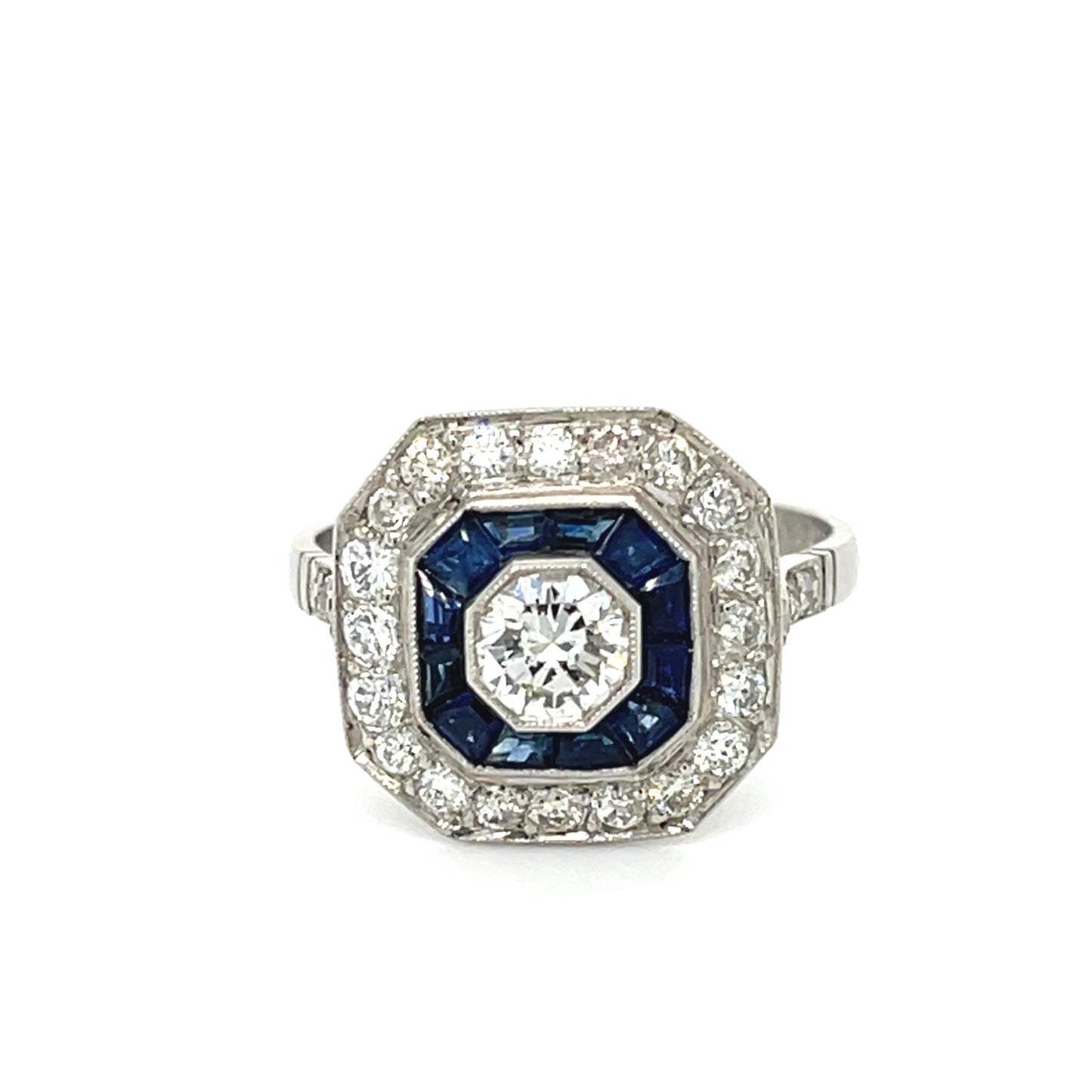 .90ct Sapphire .42ct CD .76cts SD 18KW Ring