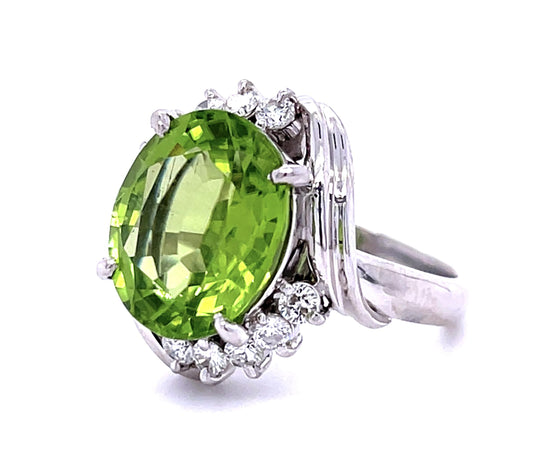 7.38ct Peridot Platinum Ring .47ct Diamond 8.80g