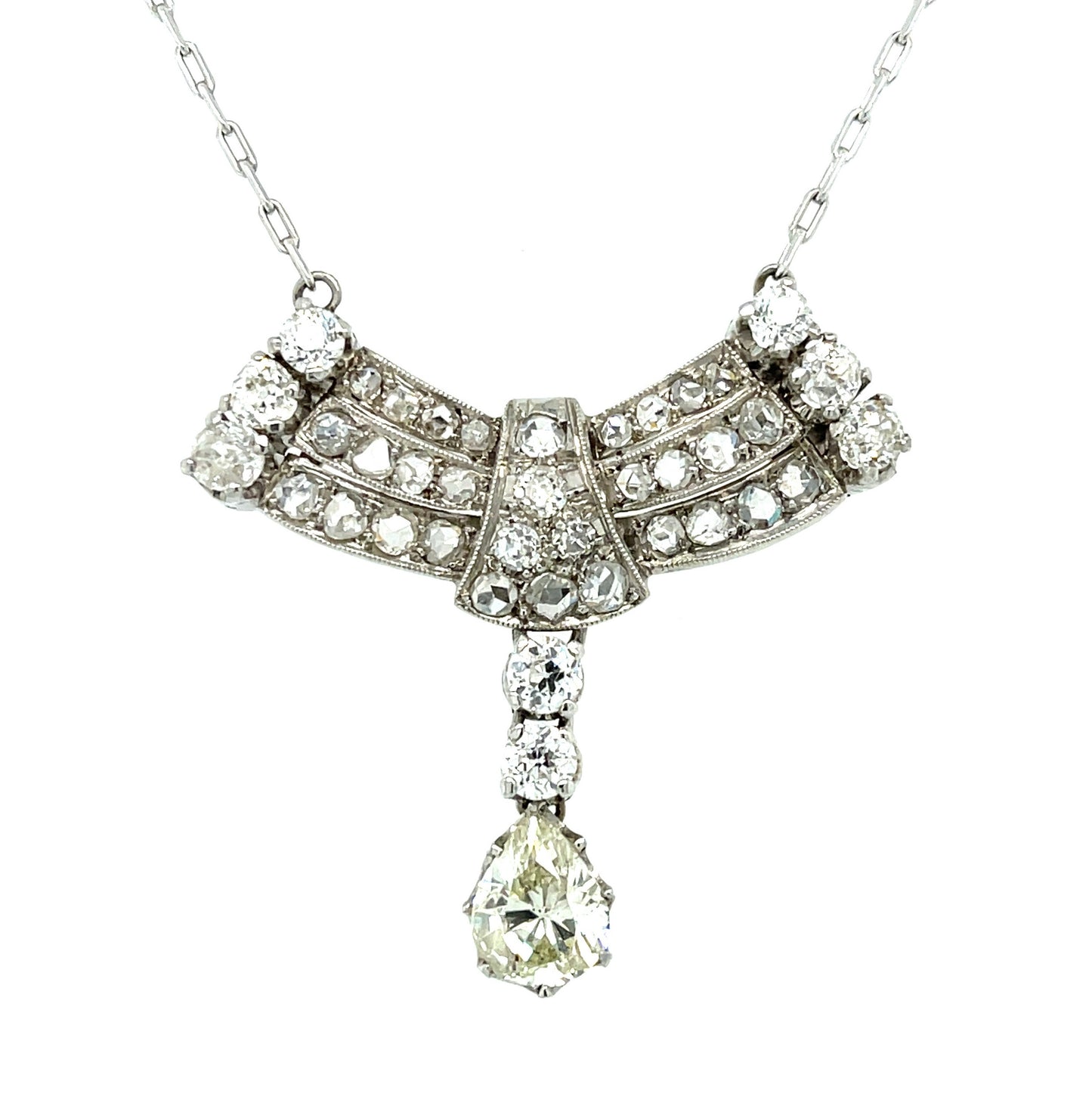 Retro (Circa 1940s) .90ct Pear Shaped Diamond 2.25ct Rose Cut and Old European Cut Diamonds Platinum Vintage Pendant