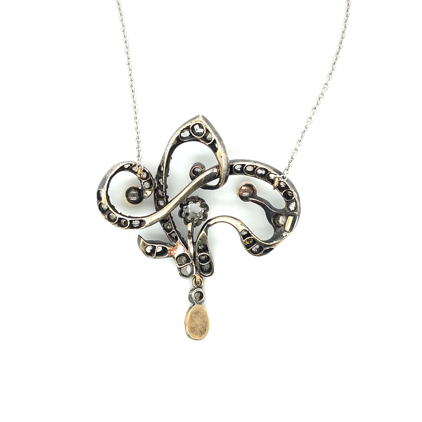 Victorian Era (Circa 1860s) .25ct Old Mine Cut Diamond 1.10ct Rose Cuts Silver+14K Antique Pendant