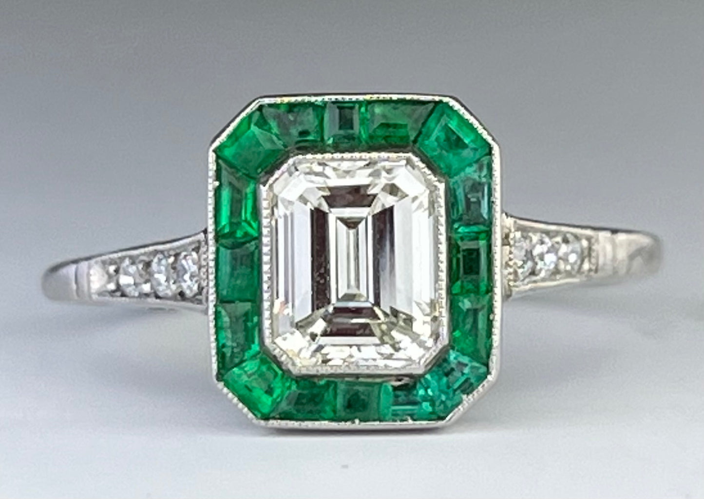 Platinum Diamond 1.02ct and Emerald Ring