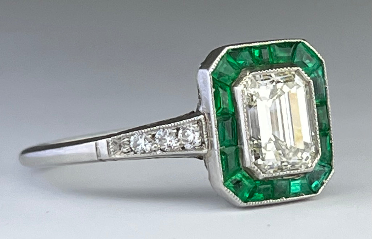 Platinum Diamond 1.02ct and Emerald Ring