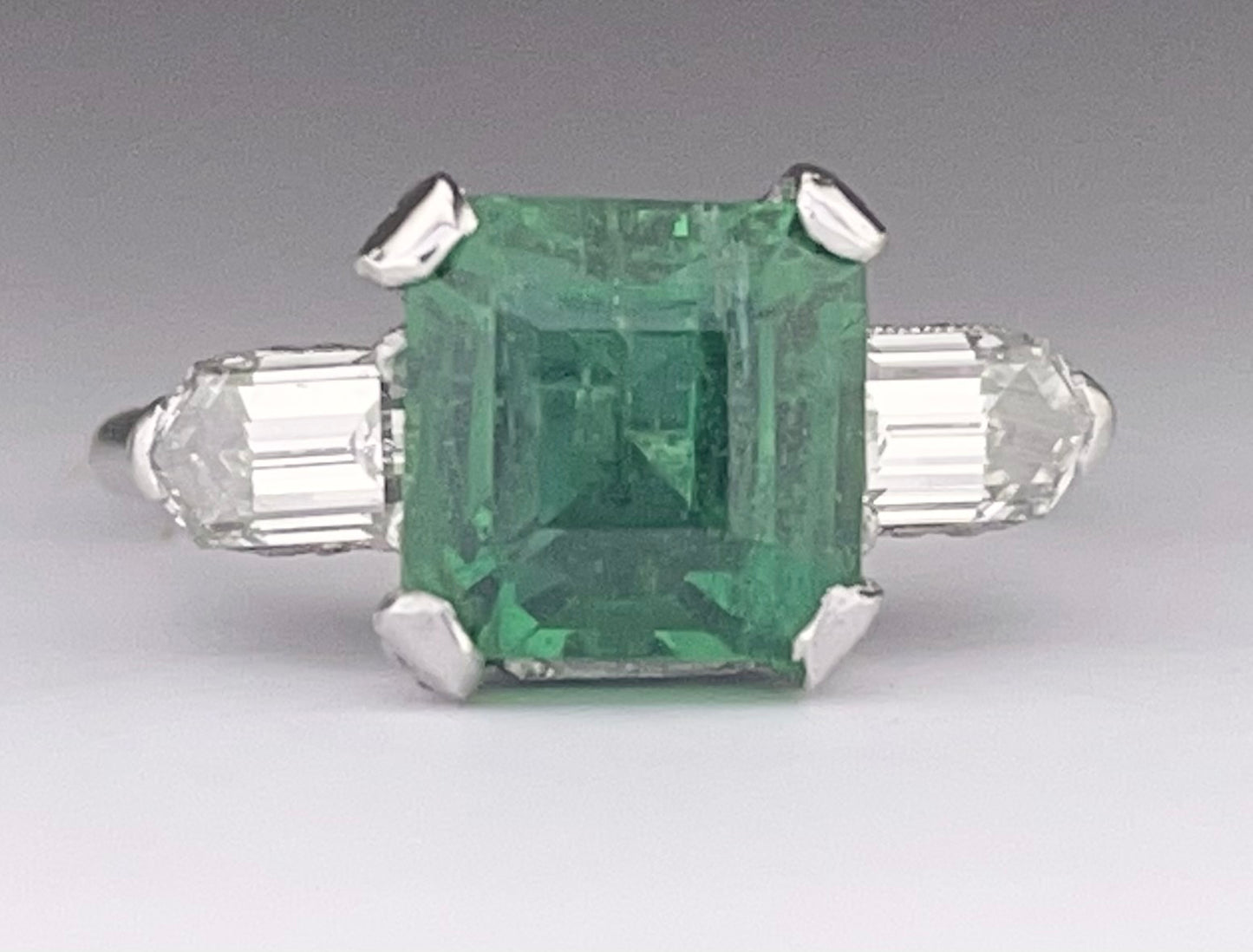 Platinum Emerald 2.95ct and Diamond Ring