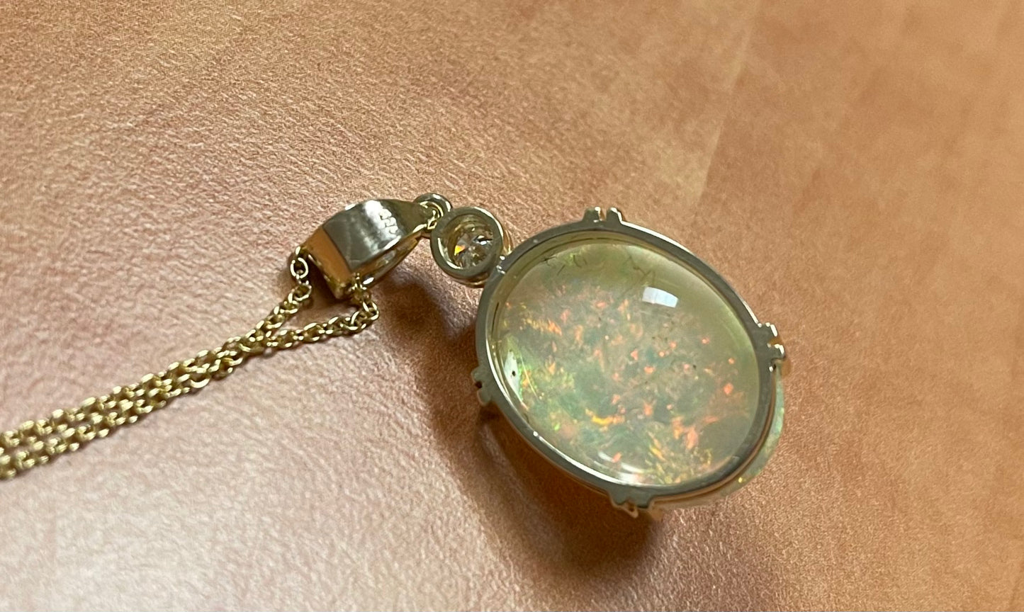 13.34ct Ethiopian Opal (Raised Surface) .20ct Diamond Near Colorless VS Clarity 14KY Handmade Pendant