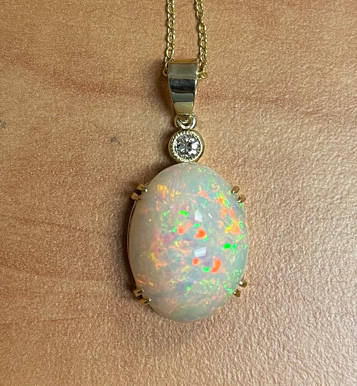 13.34ct Ethiopian Opal (Raised Surface) .20ct Diamond Near Colorless VS Clarity 14KY Handmade Pendant