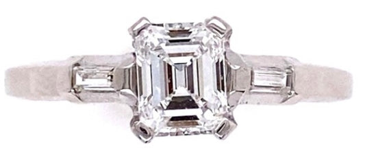 PT .66ct D VS1 Emerald-cut Diamond Ring 0.66ct(dia) .10ct(s dia) Circa 1960s