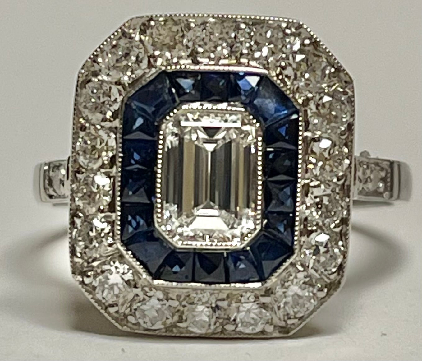 0.58ct G Diamond Vs1 &  1.20ctw Sapphire PT  4.60gr Ring Sd .76ct Size 7