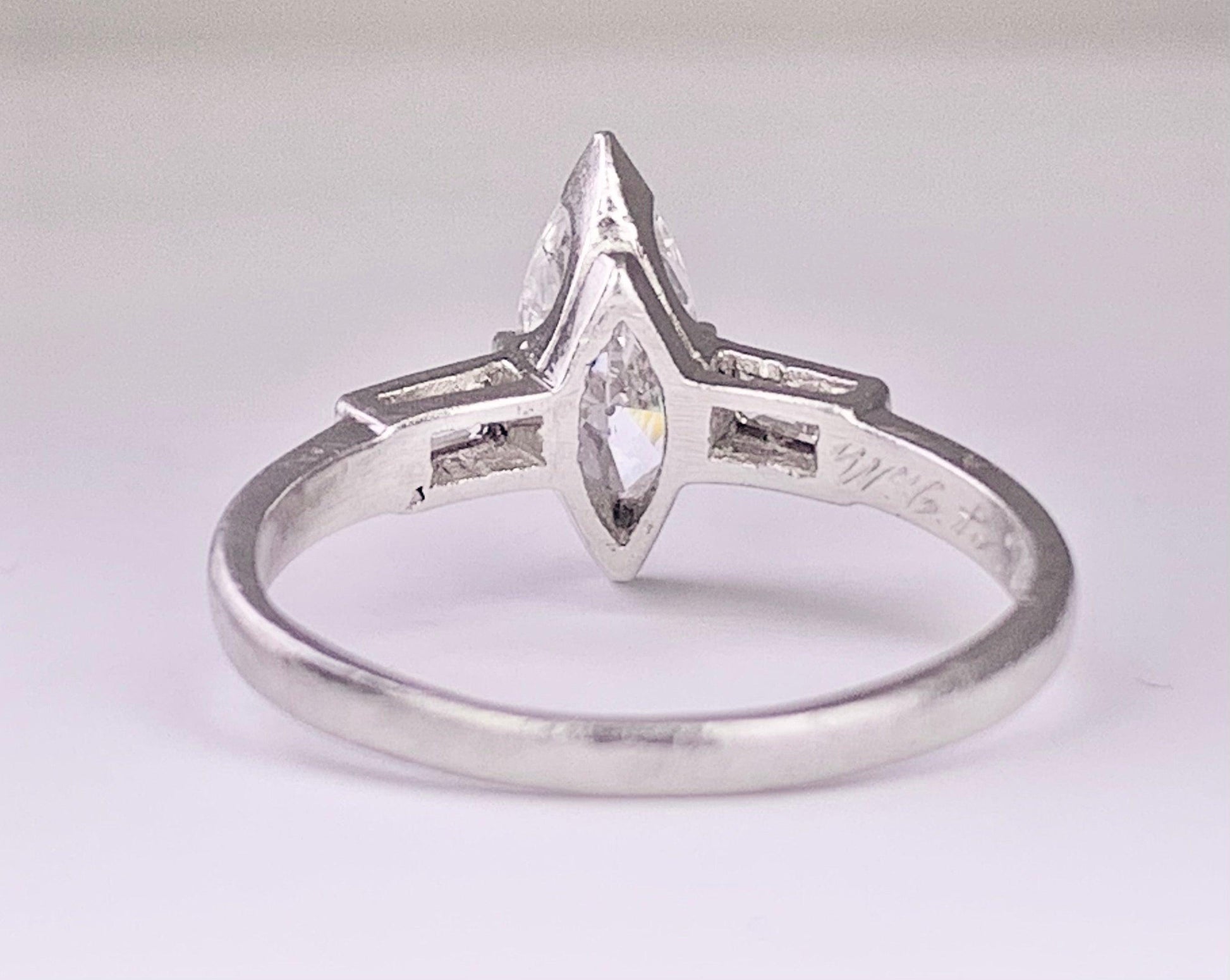 (Circa 1950s) Ring  Platinum | Marquise G VS Clarity Dia .75 carats SD .12ct