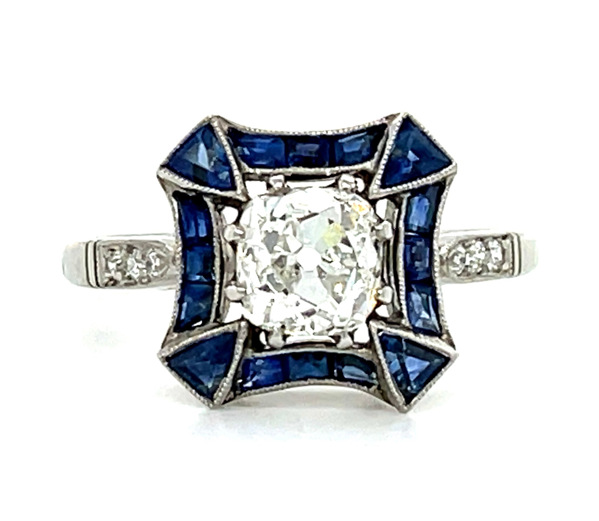 1.11ct Diamond Omc &  1.10ctw Sapphire PT  4.79gr Ring .06ct Sd Size 6.75