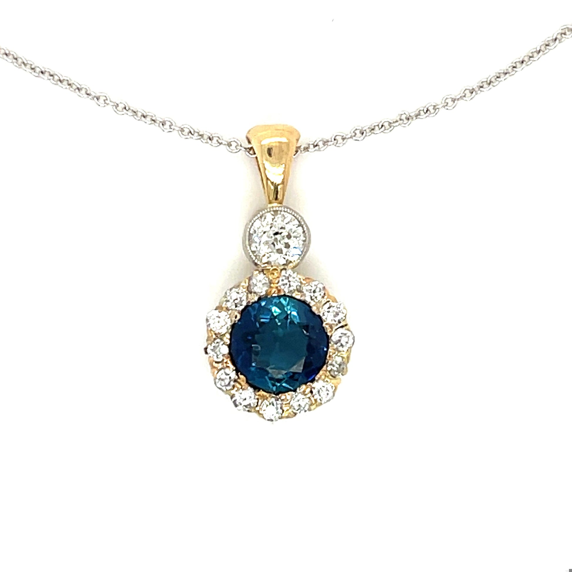 Edwardian 1.11ct Iolite Platinum over 14KY Antique Pendant (Circa 1910) .56ct Di