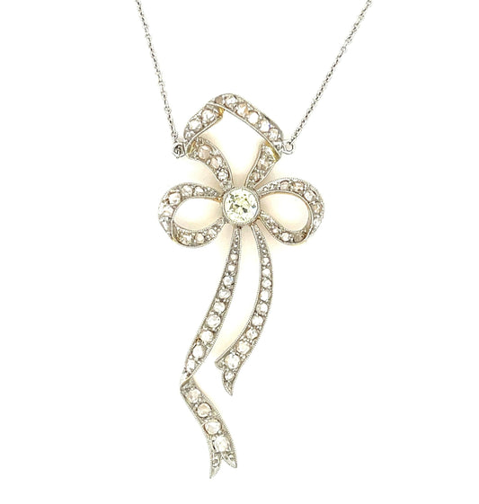 Edwardian (1900s) .30ct Old Euro Dia 1.50ct SD PT over 18KY Antique Bow Pendant
