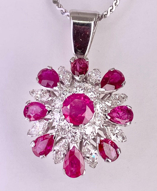 Vintage (Circa 1960s) Pendant  14KW | Center Ruby .70 carats | Side Rubies 4ct