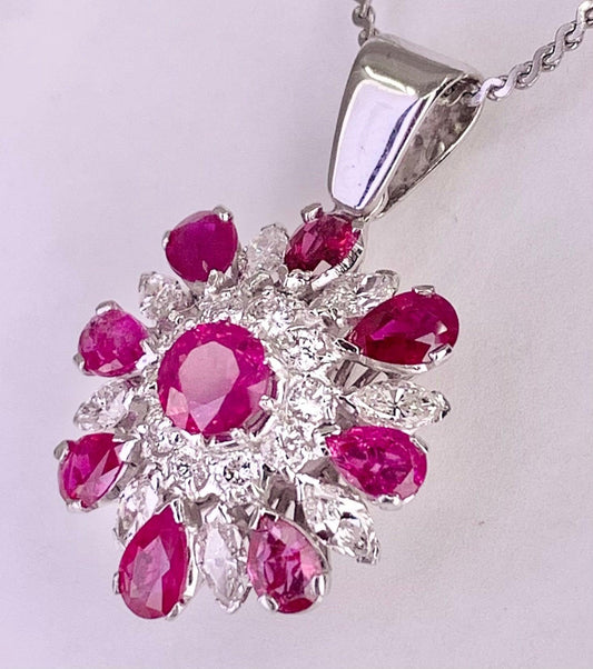 Vintage (Circa 1960s) Pendant  14KW | Center Ruby .70 carats | Side Rubies 4ct