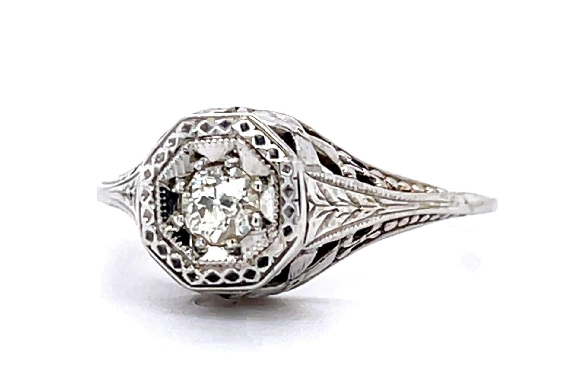 Art Deco Era (Circa 1920s) Antique Ring 18KW European cut Diamond .19 carats