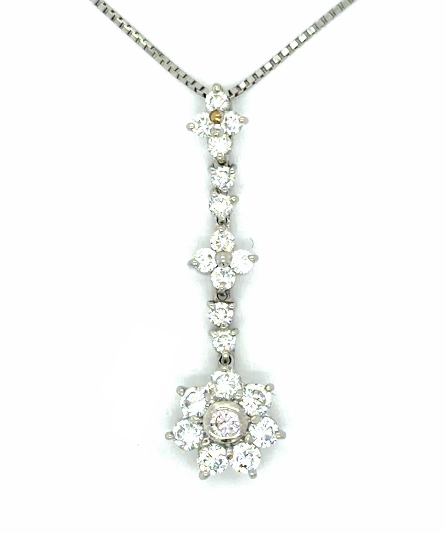 .68ct Diamond + Small Pink Diamond Platinum Pendant