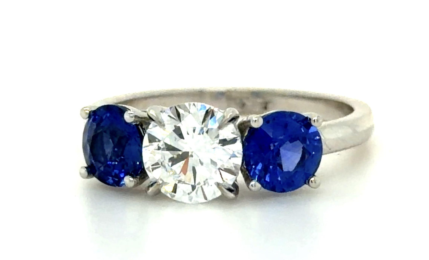 1.02ct D VVS2 Round Diamond 1.52ct Sapphire PT Three Stone Ring GIA 2235200833