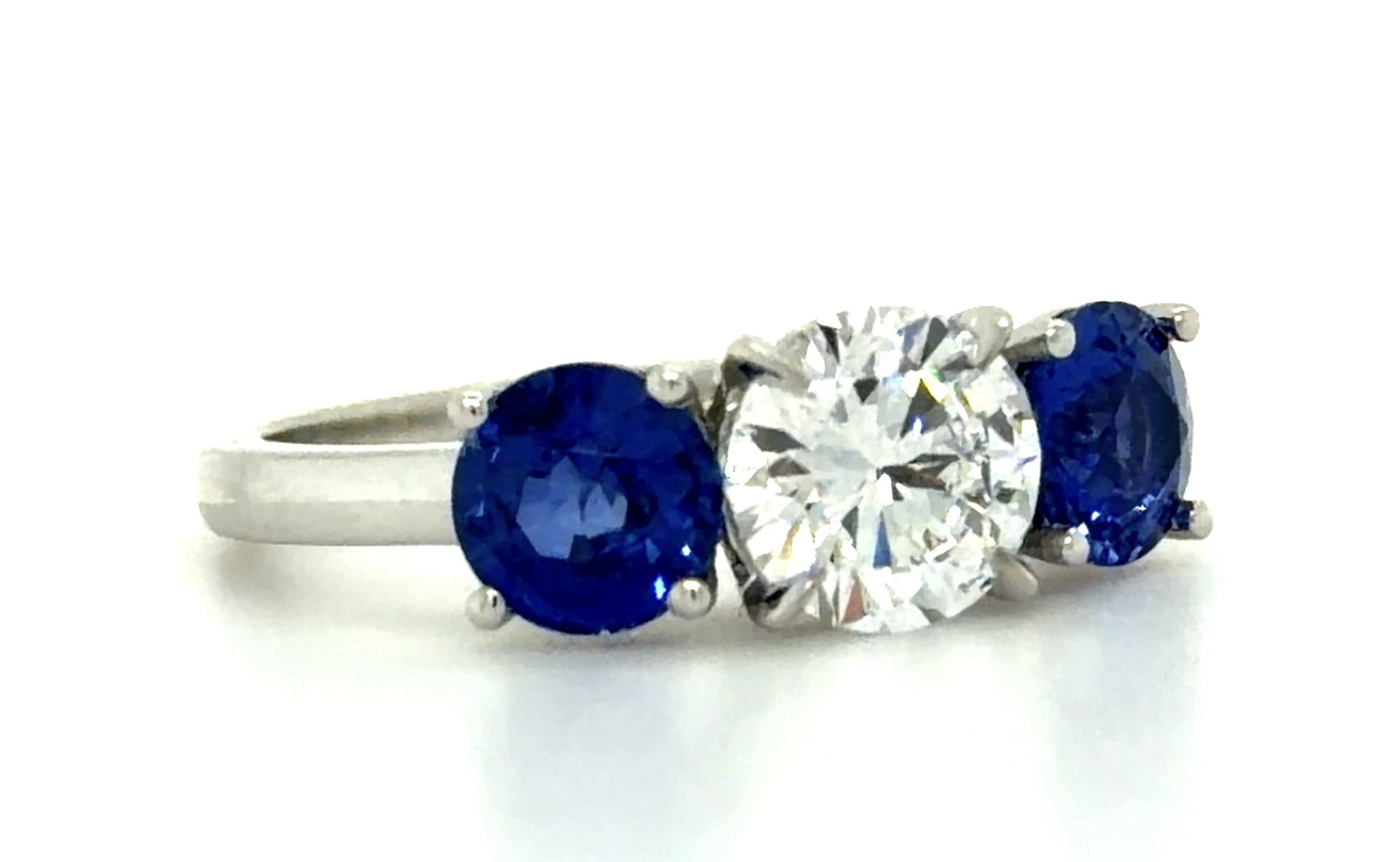 1.02ct D VVS2 Round Diamond 1.52ct Sapphire PT Three Stone Ring GIA 2235200833