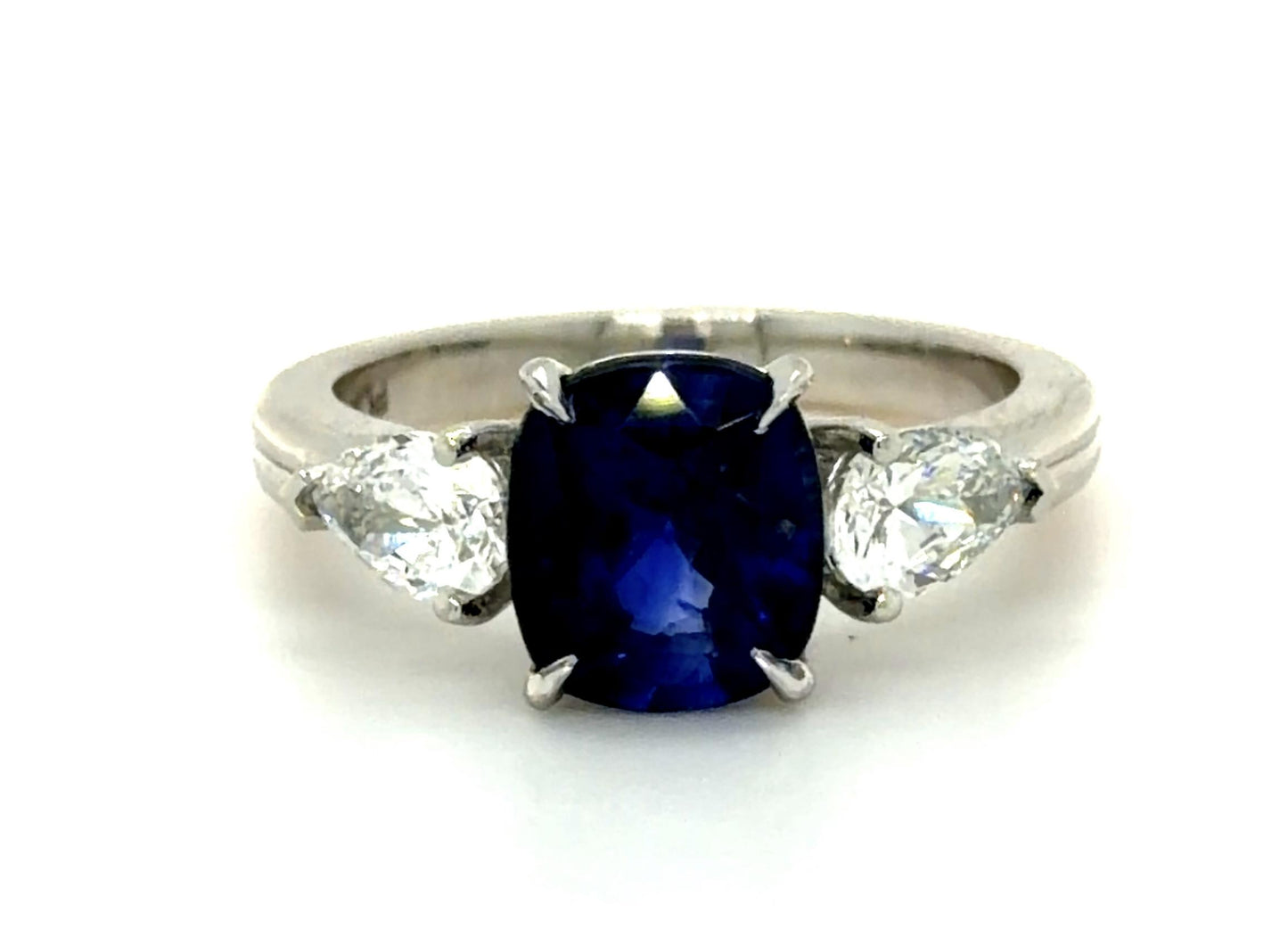2.67ct Cushion Sapphire .77ct Pear Diamonds PT Ring