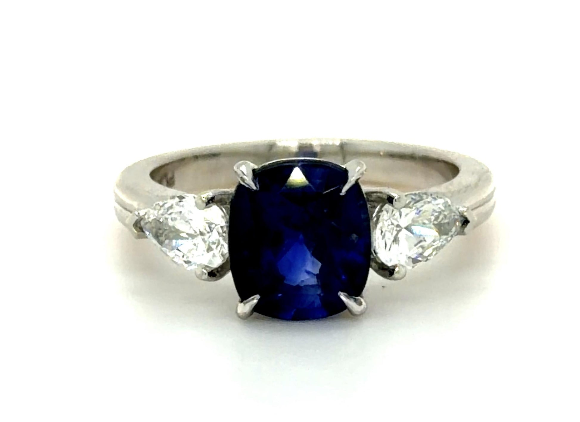 2.67ct Cushion Sapphire .77ct Pear Diamonds PT Ring