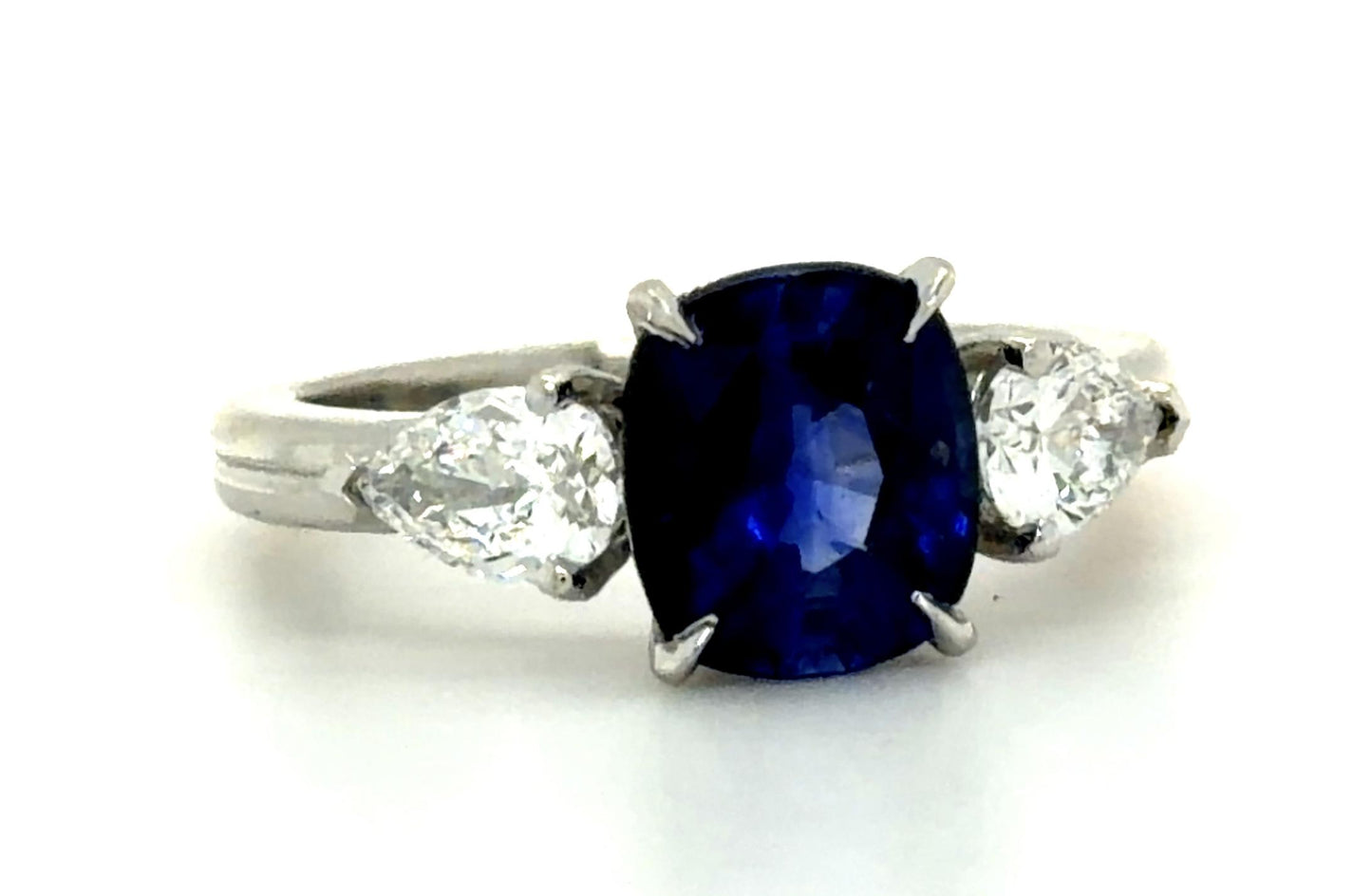 2.67ct Cushion Sapphire .77ct Pear Diamonds PT Ring