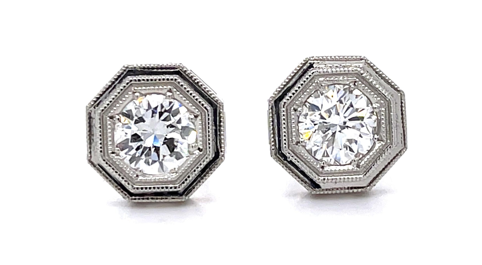 .78ct F SI1 + .97ct F VS2 Diamond PT Stud Earrings