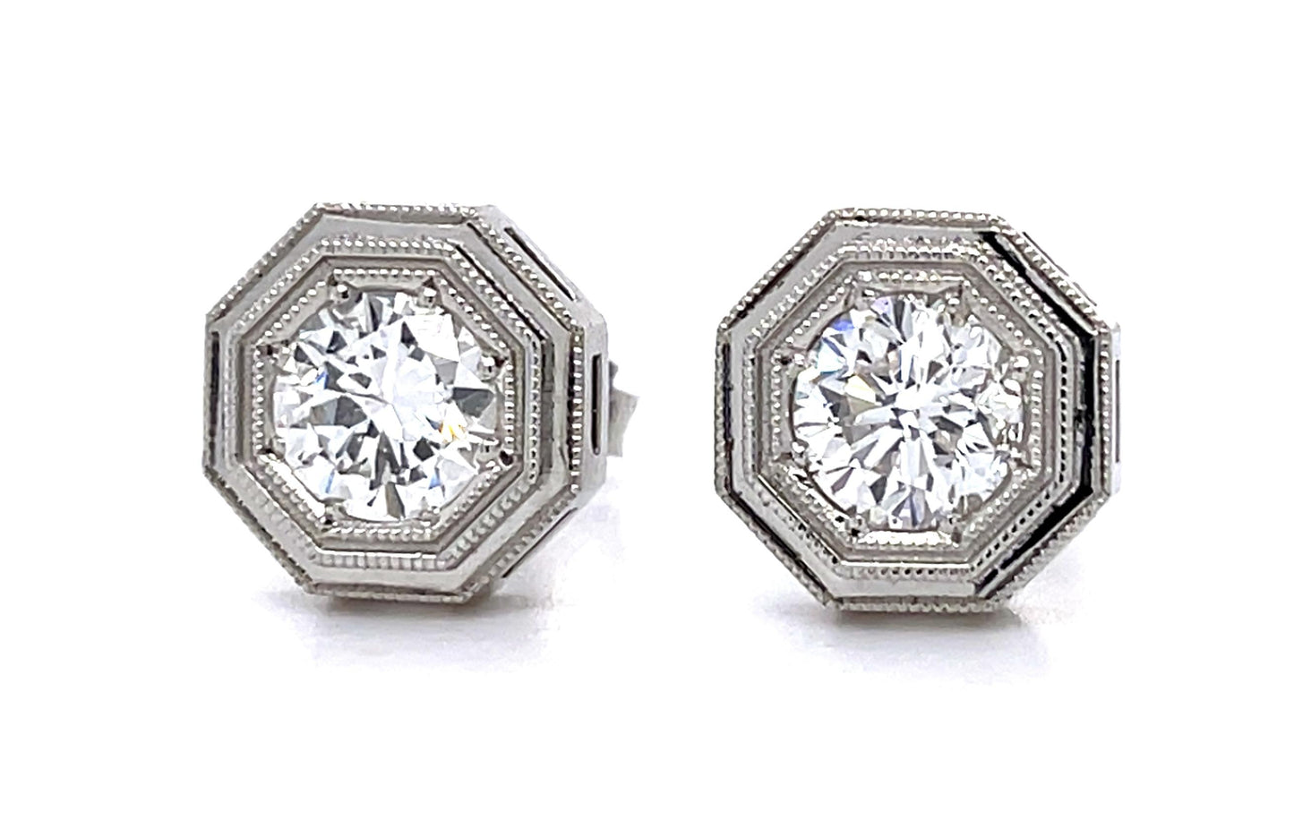 .78ct F SI1 + .97ct F VS2 Diamond PT Stud Earrings