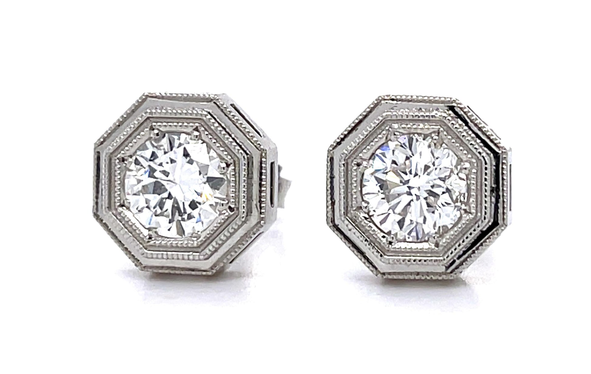 .78ct F SI1 + .97ct F VS2 Diamond PT Stud Earrings