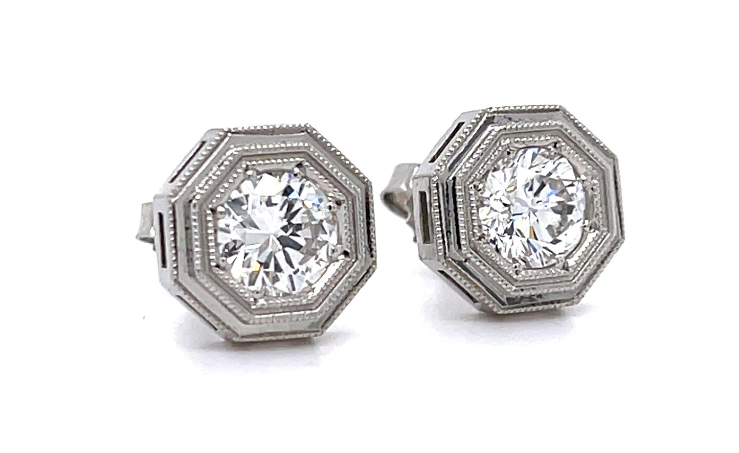 .78ct F SI1 + .97ct F VS2 Diamond PT Stud Earrings