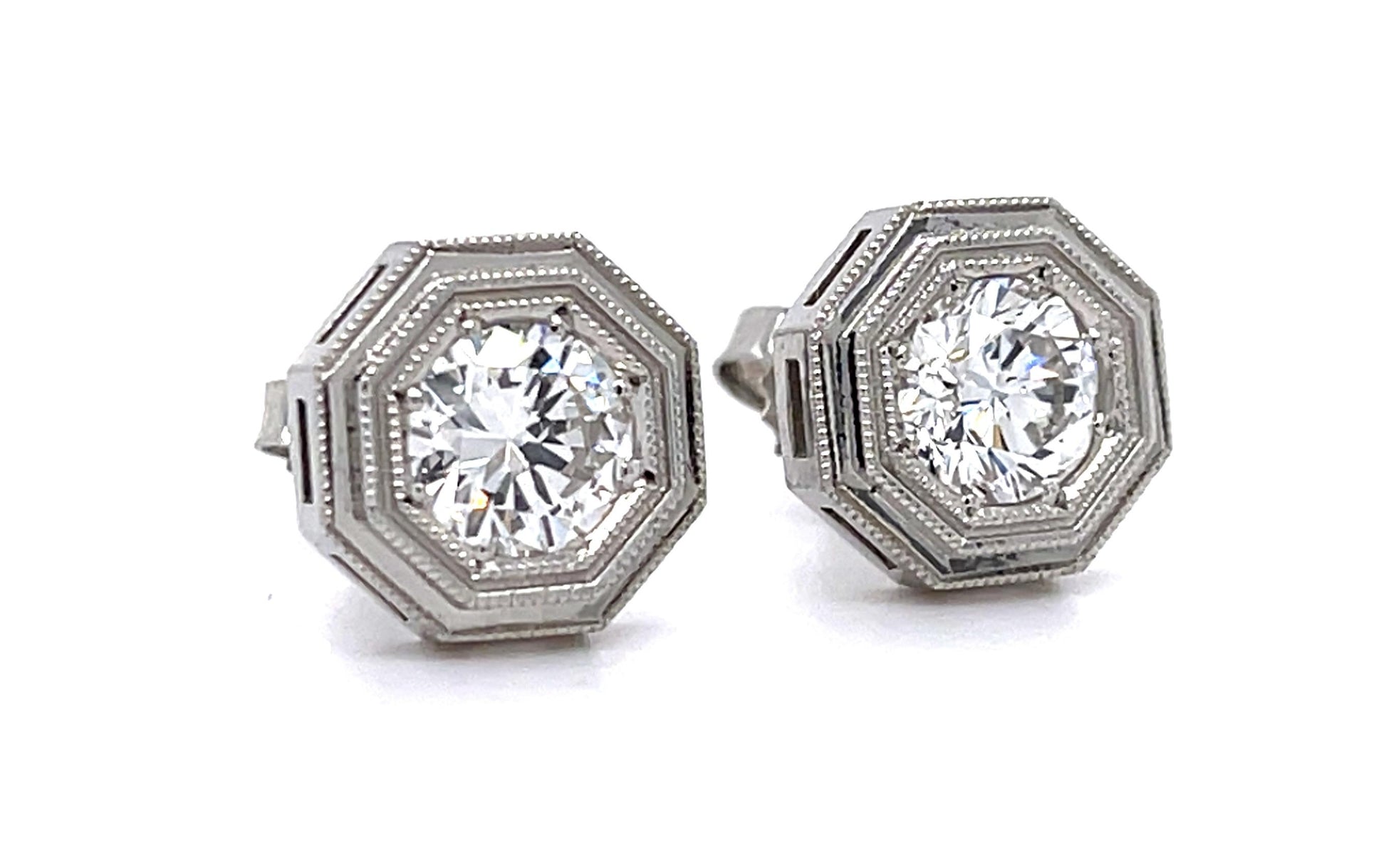 .78ct F SI1 + .97ct F VS2 Diamond PT Stud Earrings