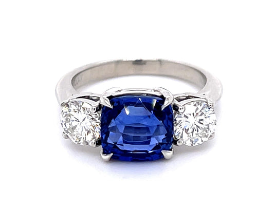 4.05ct Cushion Heated Sapphire Platinum Three Stone Ring