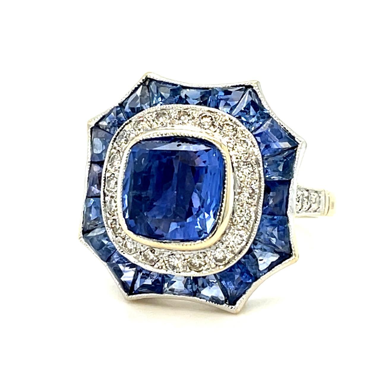 3ct Heated Sri Lanka Sapphire .52ct Diamond 18KY Ring 3.50ct Side Sapphires