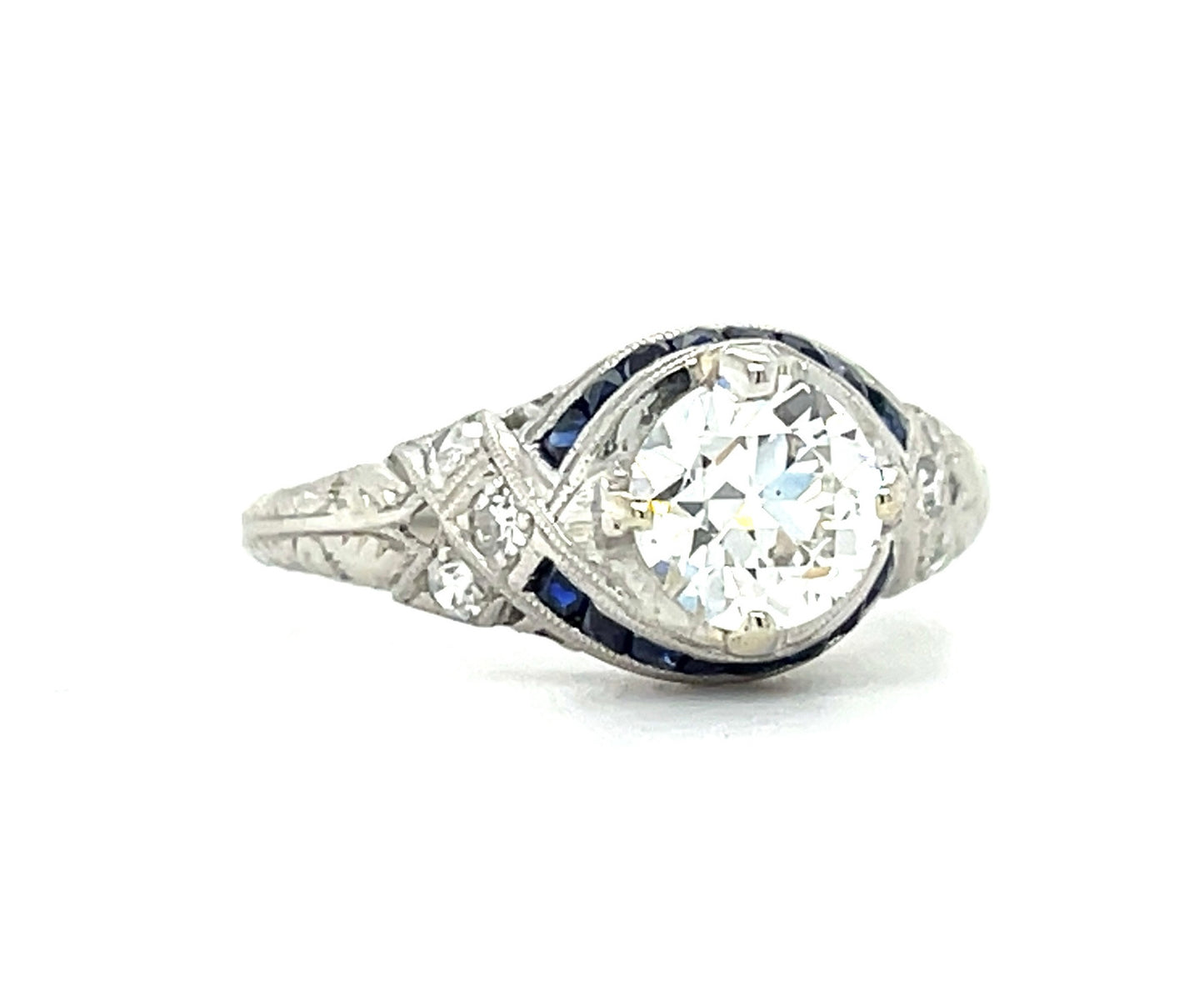 Art Deco (Circa 1920s) .86ct GIA H VS2 Old European Cut Diamond .48ct Calibre set French cut Sapphires Platinum Antique Ring