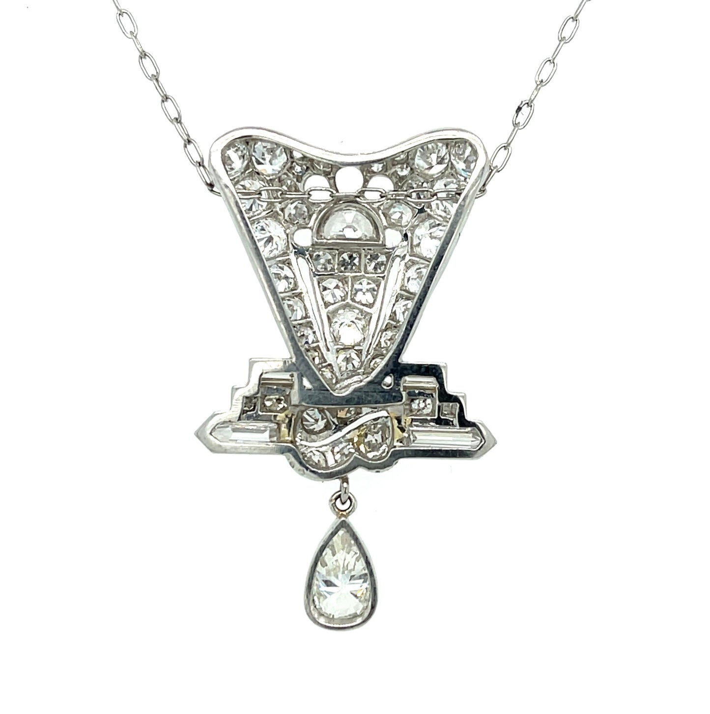 Art Deco (Circa 1920s) .40ct Pear Shaped Diamond 2.20ct Half Moon, Baguette & Bullet Side Diamonds Platinum Antique Pendant