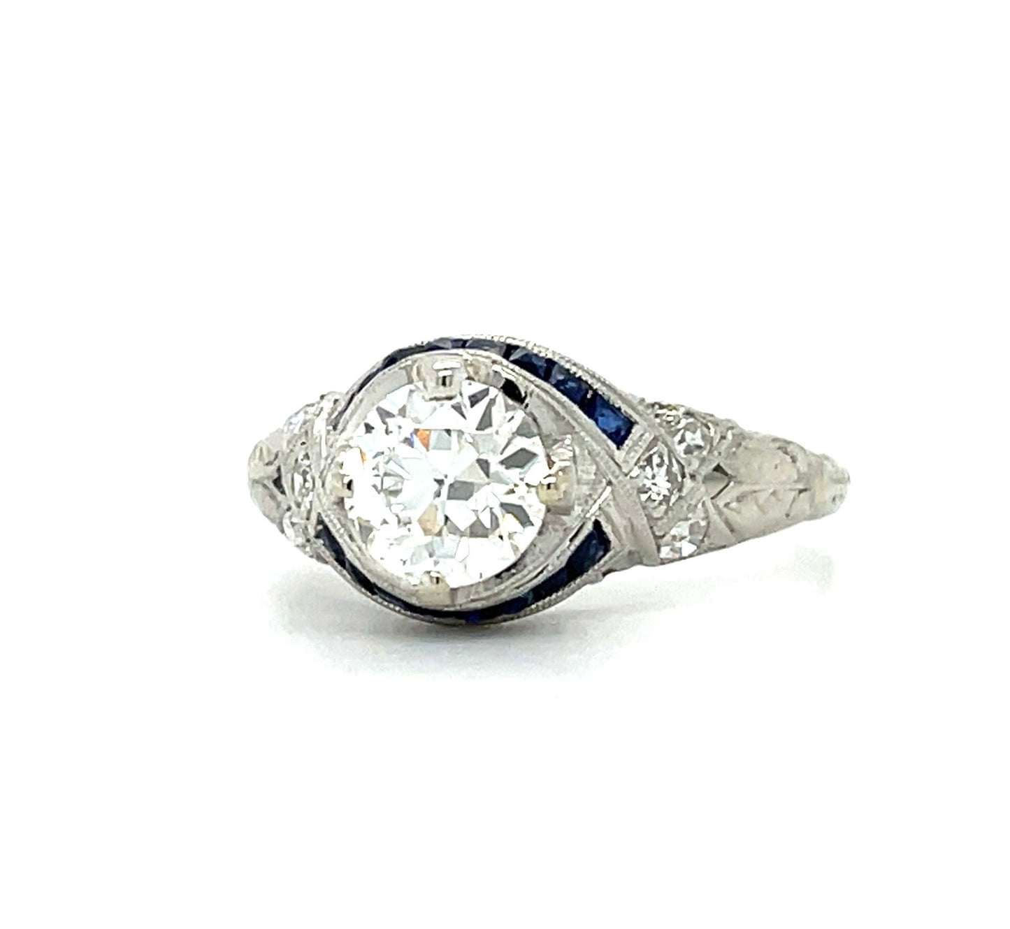 Art Deco (Circa 1920s) .86ct GIA H VS2 Old European Cut Diamond .48ct Calibre set French cut Sapphires Platinum Antique Ring