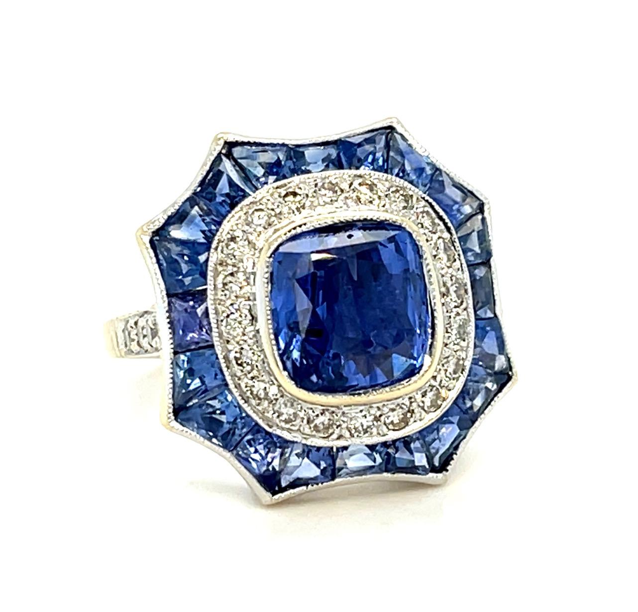 3ct Heated Sri Lanka Sapphire .52ct Diamond 18KY Ring 3.50ct Side Sapphires