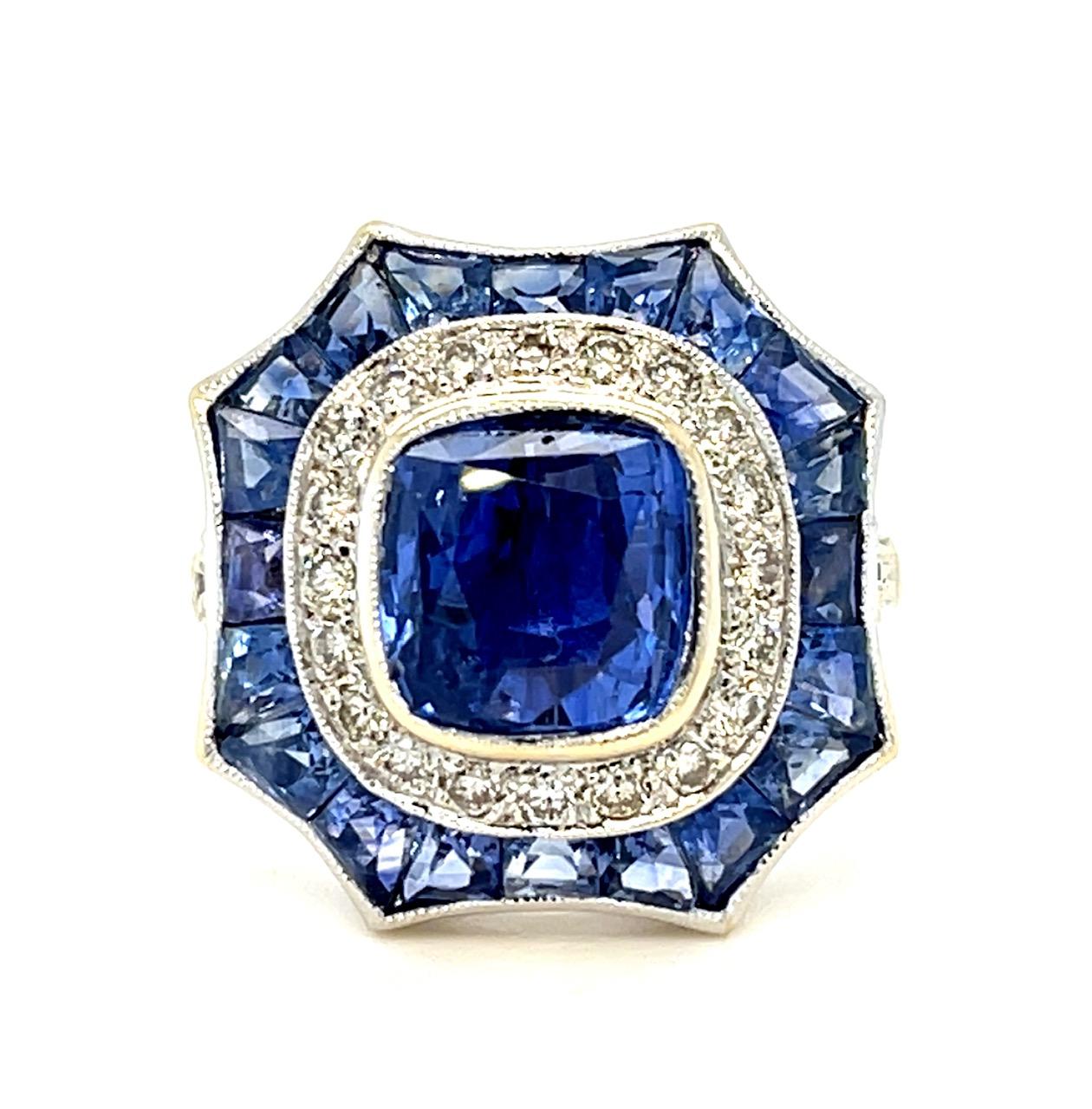 3ct Heated Sri Lanka Sapphire .52ct Diamond 18KY Ring 3.50ct Side Sapphires