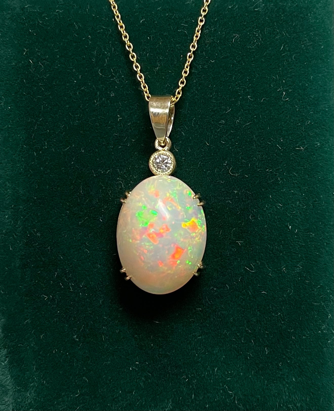 13.34ct Ethiopian Opal (Raised Surface) .20ct Diamond Near Colorless VS Clarity 14KY Handmade Pendant