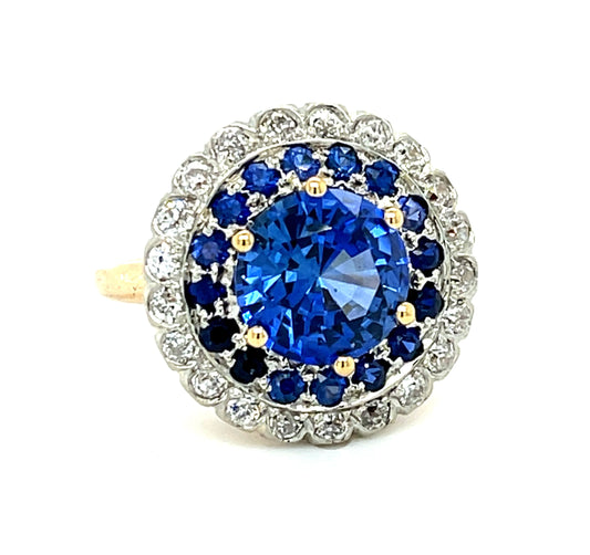 Edwardian 3.13ct Sapphire .56ct Diamonds (22 stones) .50ct Side Sapphires Platinum over 18KY Antique Ring (Circa 1910)