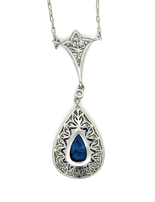 1.49ct Pear Sapphire .74ct Diamonds .69ct Calibre Side Sapphires Platinum Pendant 6.20gr Length 18"